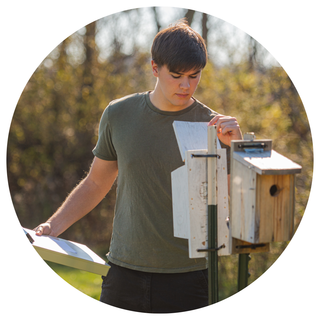 Karter Witmer checking bird boxes
